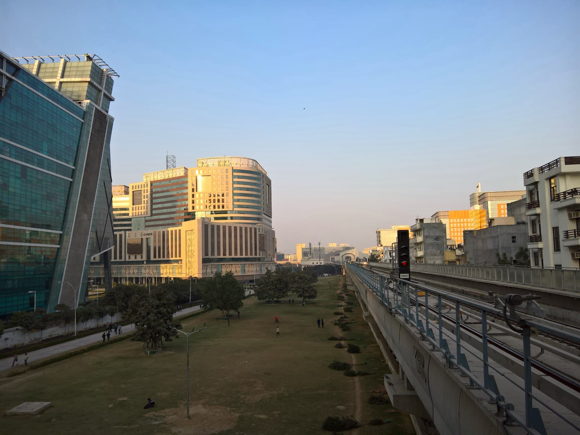 Office buildings of DLF Cyber City, Gurugram, beside the Rapid Metro track
